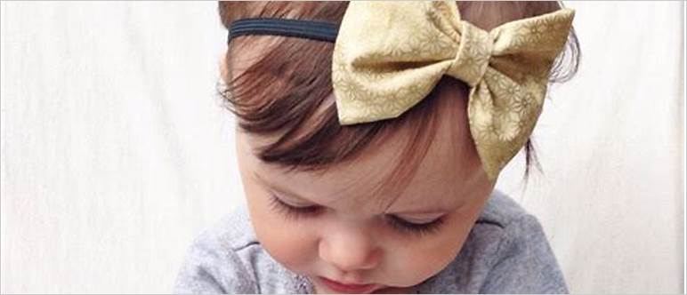 Gold infant bow